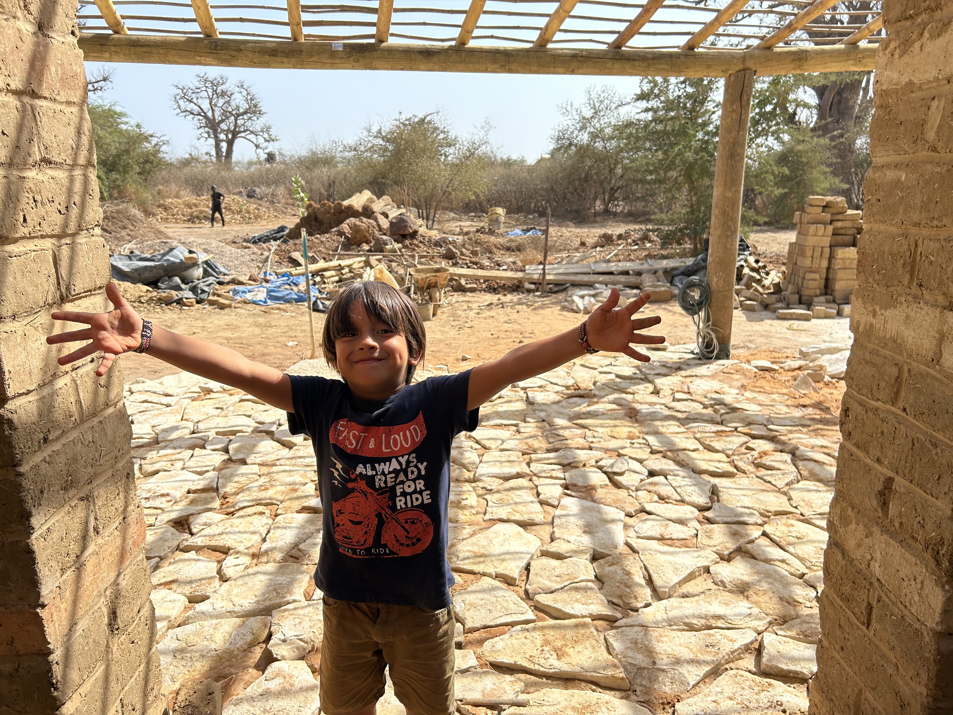A child on the stone terrace